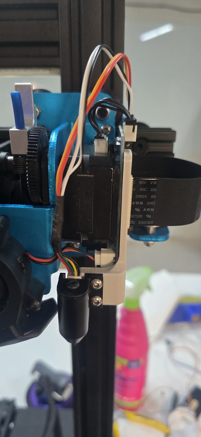 Carro X completo de la X1 con el palpador montado, el flex de 24 pines y el ventilador de capa